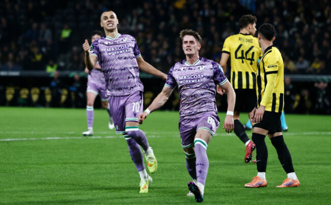 graham-burke-celebrates-scoring-his-sides-first-goal-with-michael-mcgovern
