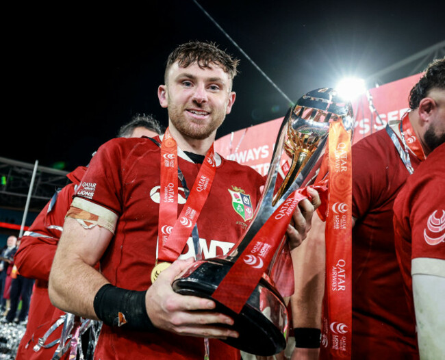 hugo-keenan-celebrates-with-the-qatar-airways-series-trophy