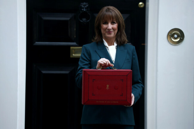 london-uk-26th-nov-2025-rachel-reeves-the-chancellor-of-the-exchequer-poses-with-the-red-budget-box-outside-11-downing-street-she-is-about-to-present-the-governments-annual-budget-to-parliamen