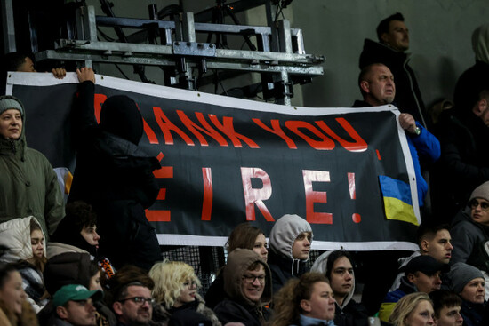 shaktar-fans-with-a-sign-during-the-game