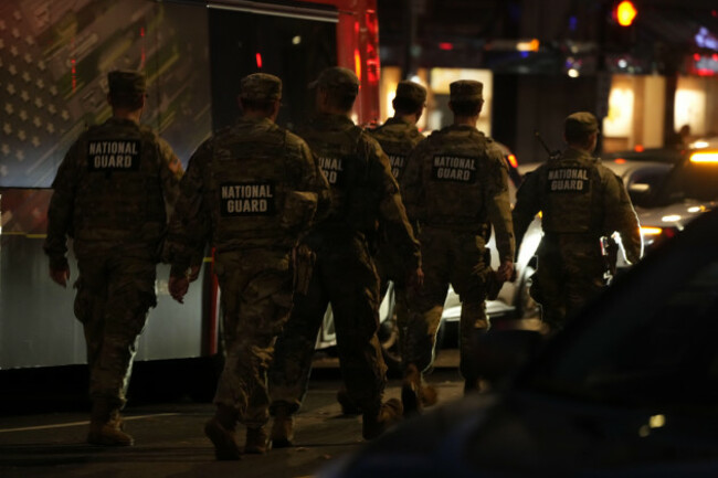 nation-guard-move-through-the-area-following-the-shooting-of-two-national-guard-soldiers-near-the-white-house-wednesday-nov-26-2025-in-washington-ap-photomark-schiefelbein