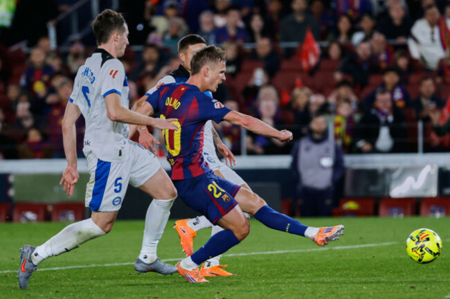 barcelonas-dani-olmo-scores-his-sides-third-goal-during-a-spanish-la-liga-soccer-match-between-barcelona-and-alaves-in-barcelona-spain-saturday-nov-29-2025-ap-photojoan-monfort