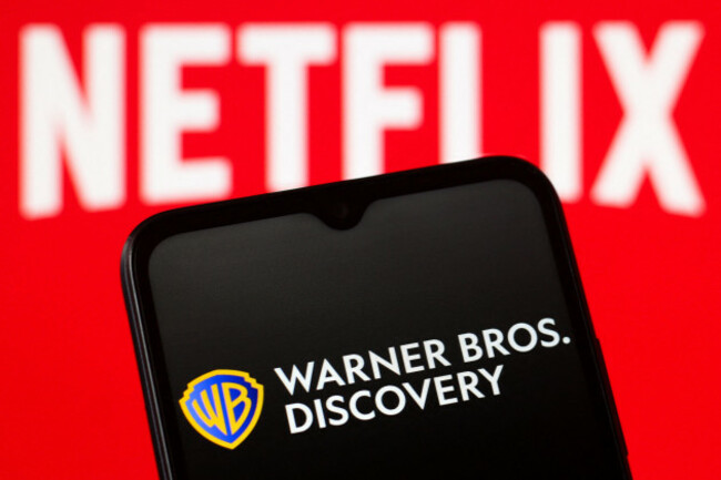 canada-6th-dec-2025-in-this-photo-illustration-the-warner-bros-discovery-logo-is-seen-displayed-on-a-smartphone-screen-and-a-netflix-logo-in-the-background-credit-image-thomas-fullerso