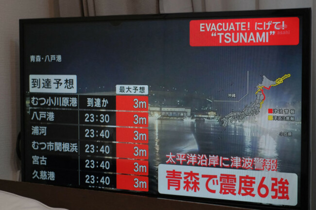 a-tv-monitor-shows-the-earthquake-that-struck-off-the-coast-of-aomori-prefecture-japan-on-december-8-2025-around-1115-pm-on-the-same-day-an-earthquake-with-its-epicenter-off-the-east-coast-of-ao