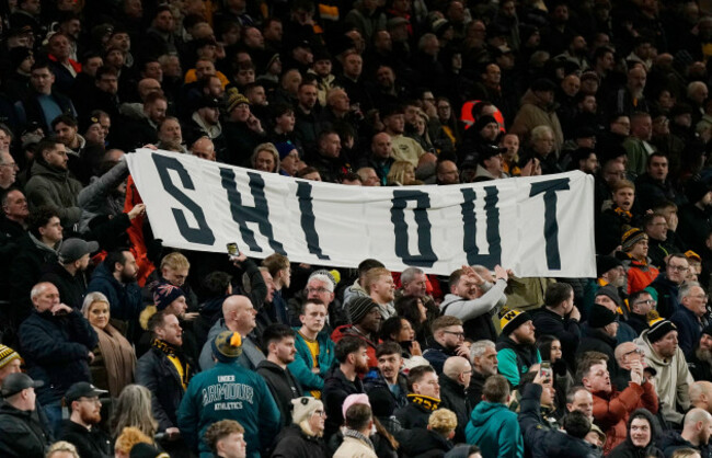 wolverhampton-uk-8th-dec-2025-wolves-fans-hold-up-a-banner-aimed-towards-the-executive-chairman-during-the-wolverhampton-wanderers-vs-manchester-united-premier-league-match-at-molineux-wolverhamp
