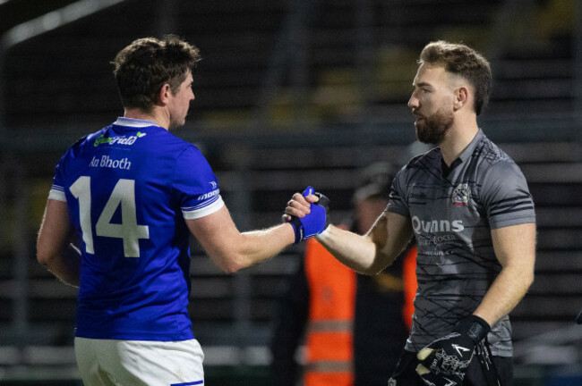 darren-hughes-shakes-hands-with-niall-kane-after-the-game