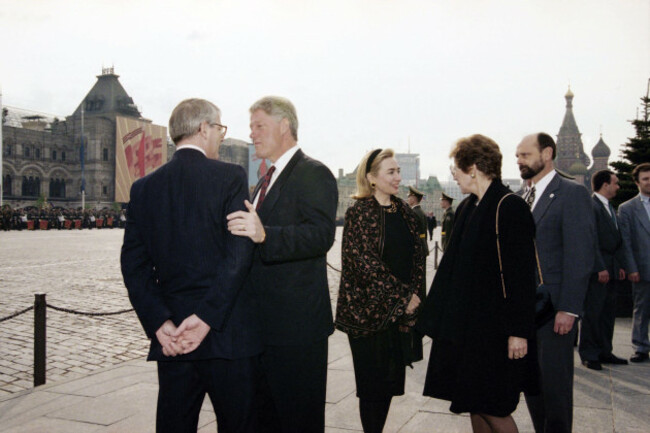 british-prime-minister-john-major-left-listens-to-u-s-president-bill-clinton-while-their-wives-hillary-rodham-clinton-and-norma-major-right-chat-at-moscows-red-square-just-before-the-parade-tue