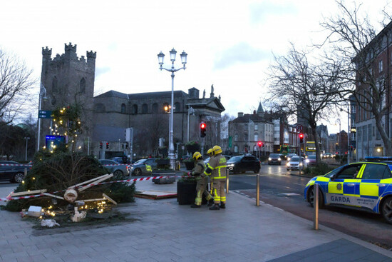 dublin-ireland-09th-december-2025-dublin-fire-brigade-attends-the-scene-at-cornmarket-in-dublin-city-as-a-christmas-tree-is-knocked-down-by-heavy-winds-during-storm-bram