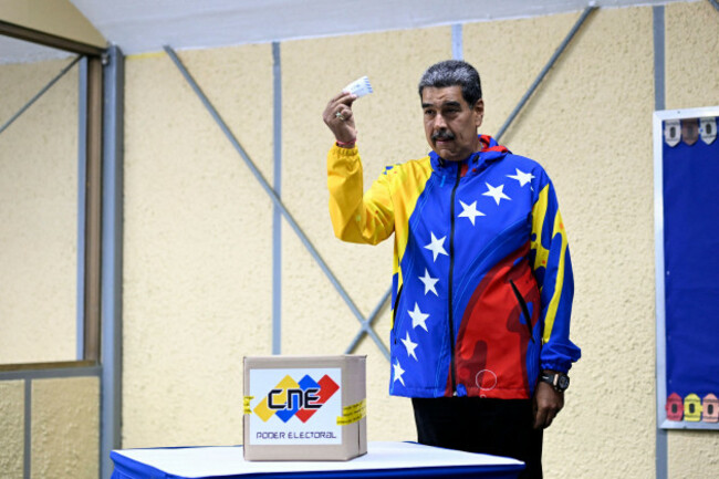 240728-caracas-july-28-2024-xinhua-venezuelan-president-nicolas-maduro-displays-his-ballot-before-voting-during-the-presidential-election-in-caracas-venezuela-july-28-2024-election-pro