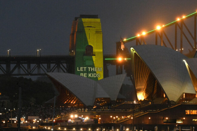sydney-australia-10th-dec-2025-the-social-media-ban-for-children-under-16-slogan-let-them-be-kids-is-seen-projected-on-the-pylons-of-the-sydney-harbour-bridge-in-sydney-wednesday-december-10