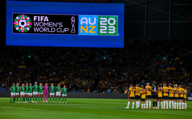 the-two-teams-stand-for-a-minutes-silence-before-the-game