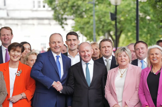 taoiseach-micheal-martin-centre-left-with-former-dublin-gaelic-football-manager-jim-gavin-who-has-been-announced-as-the-fianna-fail-presidential-candidate-at-leinster-house-in-dublin-picture-date