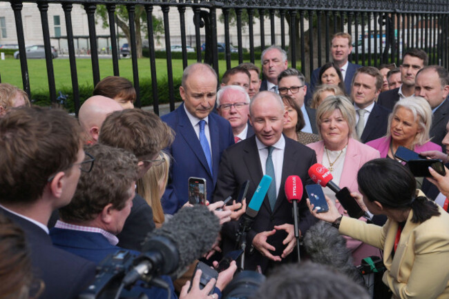 taoiseach-micheal-martin-centre-left-with-former-dublin-gaelic-football-manager-jim-gavin-centre-speaking-to-the-media-after-he-was-announced-as-the-fianna-fail-presidential-candidate-at-leinster
