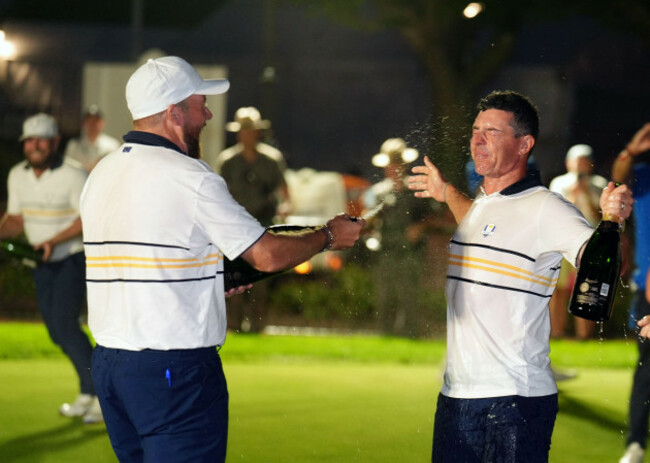 rory-mcilroy-and-shane-lowry-of-team-europe-celebrate-after-winning-the-ryder-cup-outright-beating-the-united-states-15-13-on-day-three-of-the-2025-ryder-cup-at-the-bethpage-black-course-farmingdale