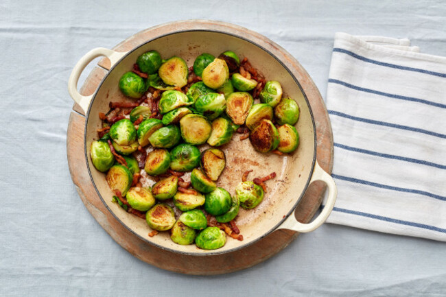 cooked-brussel-sprouts-bacon-pan-overhead-browned-kitchen-tea-towel-christmas-lunch-traditional-seasonal