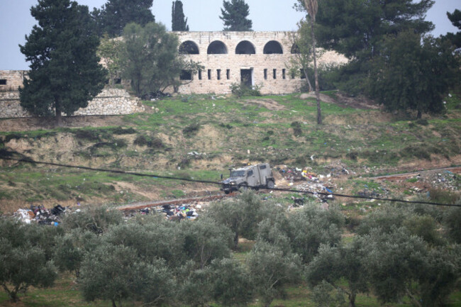 jenin-west-bank-palestine-23rd-dec-2025-an-israeli-military-vehicle-patrols-the-perimeter-of-the-abandoned-jewish-settlement-of-saanur-south-of-jenin-in-the-west-bank-in-preparation-for-the-re