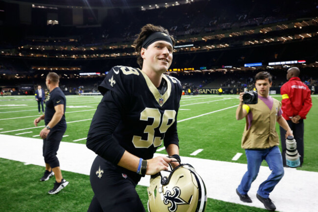 new-orleans-saints-placekicker-charlie-smyth-39-runs-off-the-field-after-an-nfl-football-game-against-the-carolina-panthers-sunday-dec-14-2025-in-new-orleans-ap-photobutch-dill