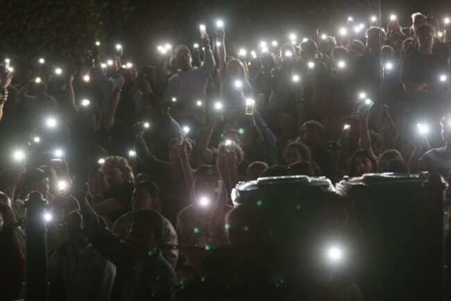 sydney-nsw-australia-31st-december-2025-new-years-eve-2025-pictured-at-11pm-people-shine-the-white-lights-on-their-phones-and-a-minutes-silence-for-the-victims-of-the-islamist-terrorist-attack