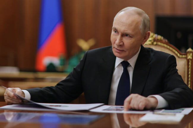 russian-president-vladimir-putin-listens-to-russian-deputy-defense-minister-and-chairwoman-of-the-defenders-of-the-fatherland-foundation-anna-tsivileva-during-their-meeting-at-the-kremlin-in-moscow-r