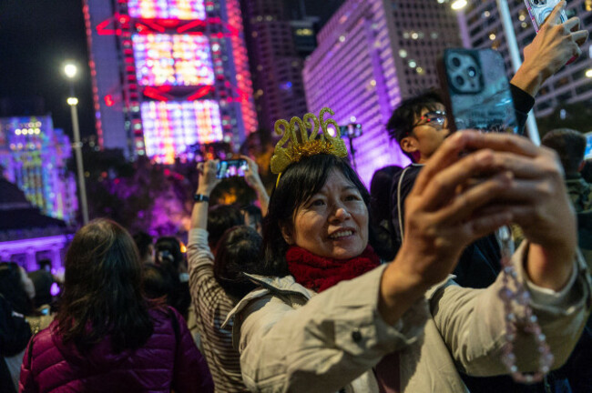 people-take-selfies-during-the-new-year-countdown-event-to-celebrate-the-start-of-2026-in-the-central-district-of-hong-kong-early-thursday-jan-1-2026-ap-photochan-long-hei
