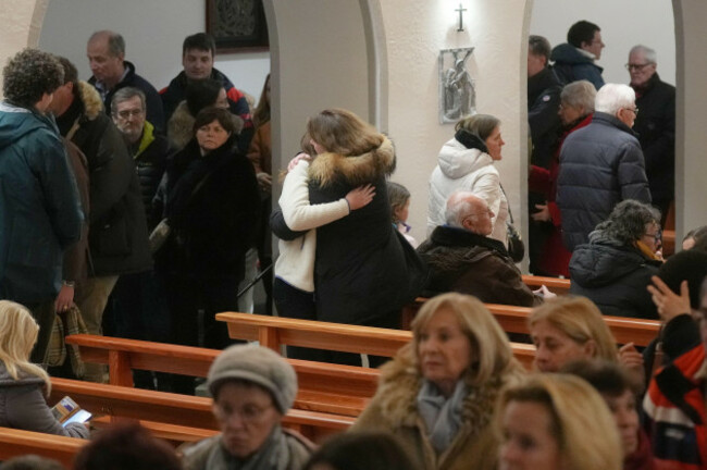 people-attend-a-new-year-mass-at-the-catholic-church-of-montana-station-to-remember-the-victims-of-the-devastating-fire-at-the-le-constellation-bar-which-left-dead-and-injured-during-the-new-years-c