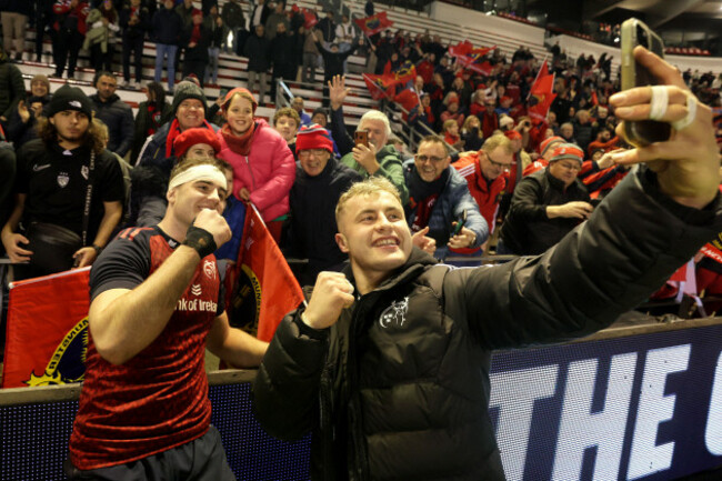 alex-kendellen-and-craig-casey-take-selfies-with-fans-after-the-game