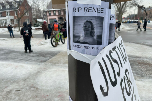 a-makeshift-memorial-honoring-the-victim-of-a-fatal-shooting-involving-federal-law-enforcement-agents-is-taped-to-a-post-near-the-site-of-the-previous-days-shooting-thursday-jan-8-2026-in-minnea