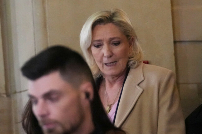 far-right-leader-marine-le-pen-leaves-the-courtroom-during-her-appeal-trial-after-an-embezzlement-conviction-tuesday-jan-13-2026-in-paris-ap-photochristophe-ena