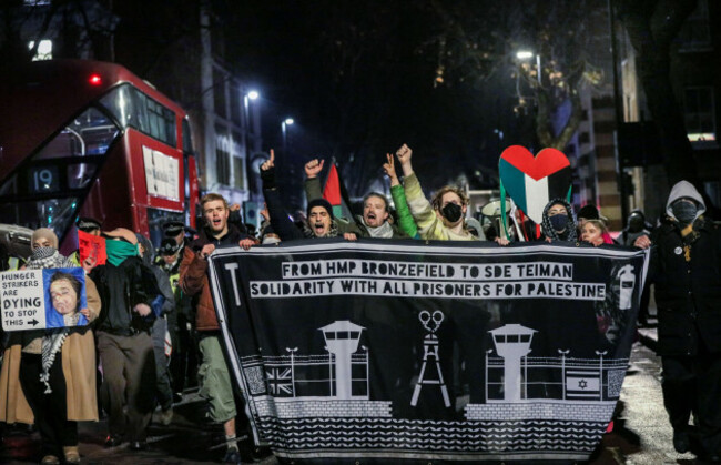 protesters-take-to-the-streets-around-pentonville-prison-marching-behind-a-banner-supporting-prisoners-for-palestine-protesters-gather-outside-hmp-pentonville-where-kamran-ahmed-is-being-held-on-rema