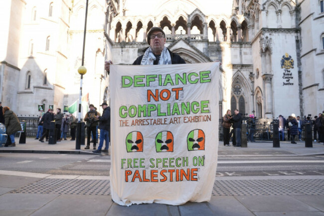 a-supporter-of-the-irish-rap-group-kneecap-outside-the-royal-courts-of-justice-in-london-ahead-of-a-challenge-to-the-decision-by-the-chief-magistrate-in-september-2025-to-throw-out-the-terrorism-case