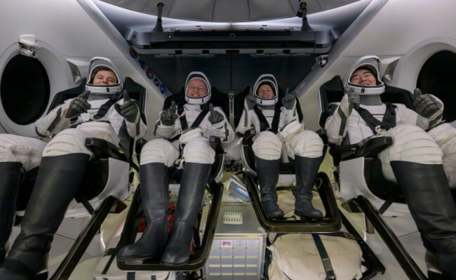 roscosmos-cosmonaut-oleg-platonov-left-nasa-astronauts-mike-fincke-zena-cardman-and-jaxa-japan-aerospace-exploration-agency-astronaut-kimiya-yui-are-seen-inside-the-spacex-dragon-endeavour-space