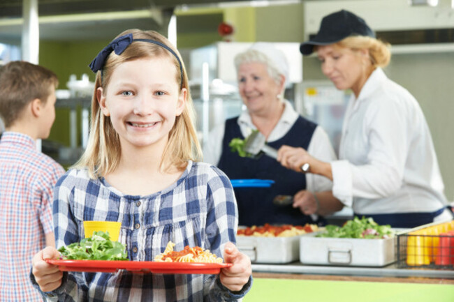 female-pupil-with-healthy-lunch-in-school-canteen