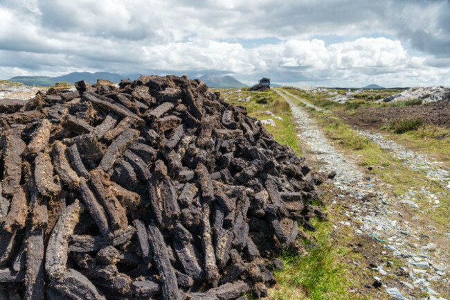 a-pile-of-turf-extracted-from-a-peat-bog-in-rural-ireland