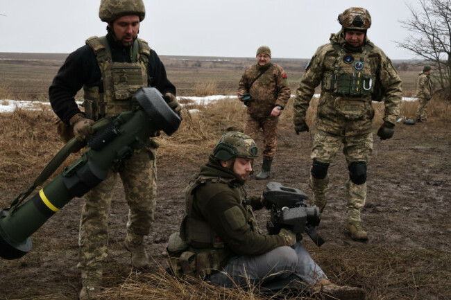 in-this-photo-provided-by-ukraines-65th-mechanized-brigade-press-service-soldiers-prepare-a-fgm-148-javelin-anti-tank-missile-system-during-a-drill-close-to-the-frontline-in-the-zaporizhzhia-regio