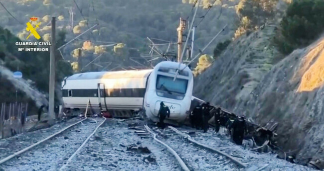 in-this-grab-taken-from-video-provided-by-guardia-civil-rescue-workers-at-the-scene-after-a-high-speed-train-collision-in-adamuz-spain-monday-jan-19-2026-guardia-civil-via-ap