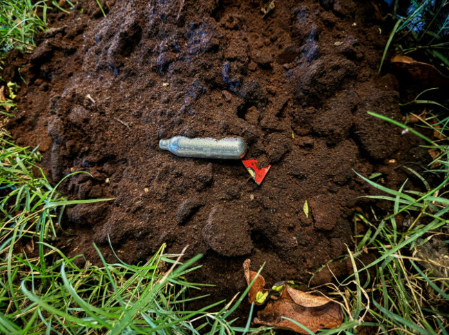 lipa-philippines-sept-092025-a-nitrous-oxide-canister-n2o-known-as-laughing-gas-lies-discarded-in-front-a-nightlife-place-these-gas-canisters-are-increasingly-used-recreationally-in-some-coun