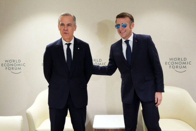 davos-switzerland-20th-jan-2026-prime-minister-mark-carney-meets-with-french-president-emmanuel-macron-as-they-attend-the-world-economic-forum-in-davos-switzerland-on-tuesday-jan-20-2026-cred