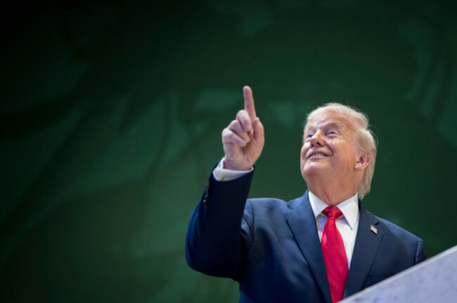 president-donald-trump-gestures-in-the-hallway-after-his-special-address-during-the-56th-annual-meeting-of-the-world-economic-forum-wef-in-davos-switzerland-wednesday-jan-21-2026-gian-ehrenze