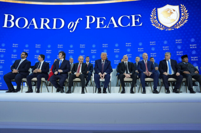 president-donald-trump-center-poses-with-international-leaders-after-the-signing-of-a-board-of-peace-charter-during-the-annual-meeting-of-the-world-economic-forum-in-davos-switzerland-thursday-ja
