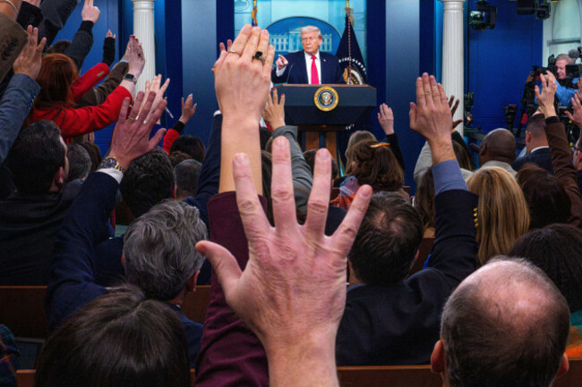 washington-united-states-of-america-20th-jan-2026-journalists-try-to-ask-united-states-president-donald-j-trump-a-question-as-he-joins-the-white-house-briefing-in-the-james-s-brady-press-briefing