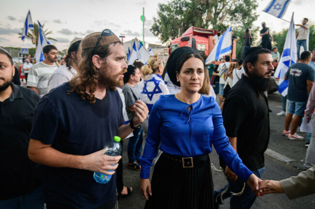 kfar-yona-israel-29th-july-2024-knesset-member-limor-son-har-melech-from-the-far-right-wing-otzma-yehudit-party-walks-next-to-the-released-israeli-administrative-detainee-ariel-danino-israeli-r