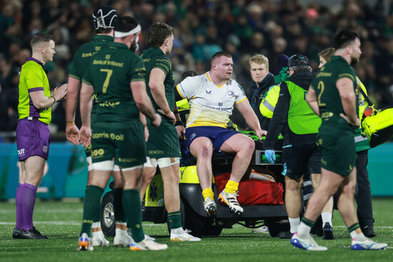 jack-boyle-leaves-the-field-on-a-motorised-stretcher-due-to-an-injury