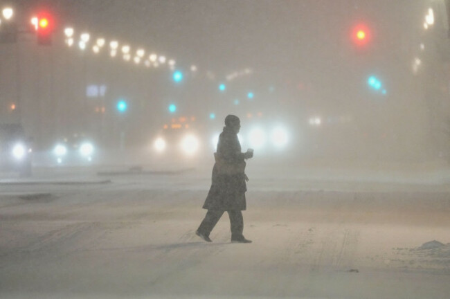 a-person-walks-across-a-street-during-a-winter-storm-in-philadelphia-sunday-jan-25-2026-ap-photomatt-rourke