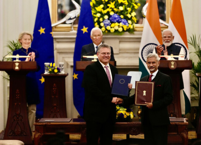 indian-prime-minister-narendra-modi-rear-right-european-council-president-antonio-costa-rear-center-and-european-commission-president-ursula-von-der-leyen-rear-left-applaud-as-indian-foreign-min