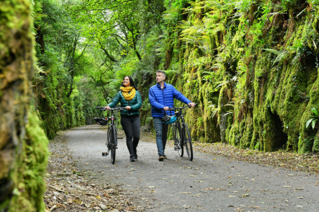 couple-cycling-along-the-waterford-greenway
