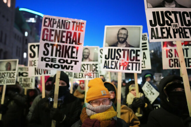 demonstrators-gather-during-a-rally-against-federal-immigration-enforcement-at-federal-courthouse-plaza-on-tuesday-jan-27-2026-in-minneapolis-ap-photoadam-gray