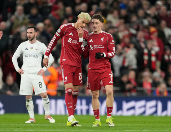 liverpools-florian-wirtz-celebrates-scoring-their-sides-second-goal-of-the-game-with-teammate-hugo-ekitike-during-the-uefa-champions-league-league-phase-match-at-anfield-liverpool-picture-date-w