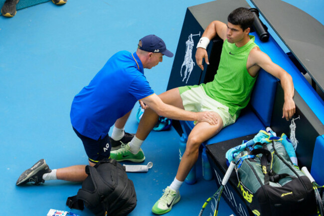 melbourne-australia-30th-jan-2026-1st-seed-carlos-alcaraz-of-spain-receives-treatment-during-a-medical-time-out-against-3rd-seed-alexander-zverev-of-germany-on-rod-laver-arena-in-a-mens-singles-s