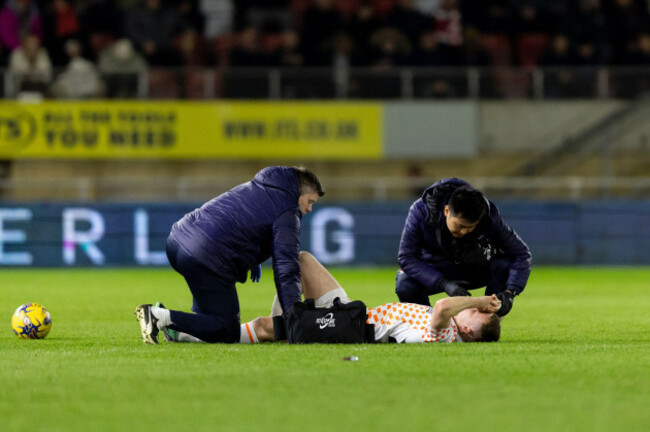 andy-lyons-of-blackpool-is-attended-to-by-medics-during-the-sky-bet-league-1-match-leyton-orient-vs-blackpool-at-matchroom-stadium-london-united-kingdom-27th-february-2024photo-by-juan-gasparini