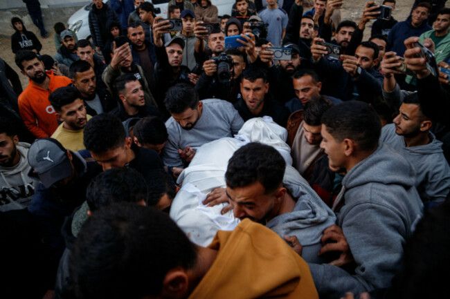 gaza-palestine-territories-04th-feb-2026-families-and-relatives-carry-the-body-of-hamada-alhabil-during-his-funeral-in-gaza-on-february-4-2026-after-he-was-killed-in-an-israeli-strike-despite-a